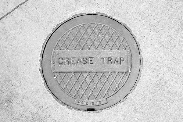 during grease trap pumping, a professional will remove the accumulated grease and food particles from your grease trap